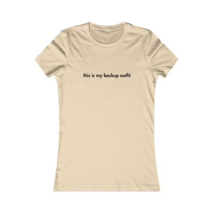 Beige t-shirt with text 'this is my backup outfit' on a white background