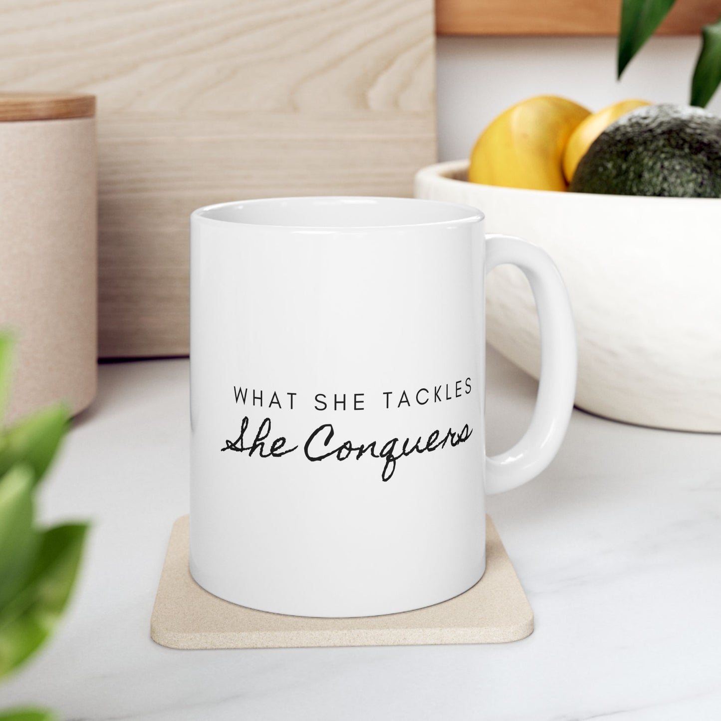 “What She Tackles, She Conquers” Mug