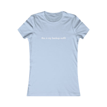 Light blue t-shirt with text 'this is my backup outfit' on a white background