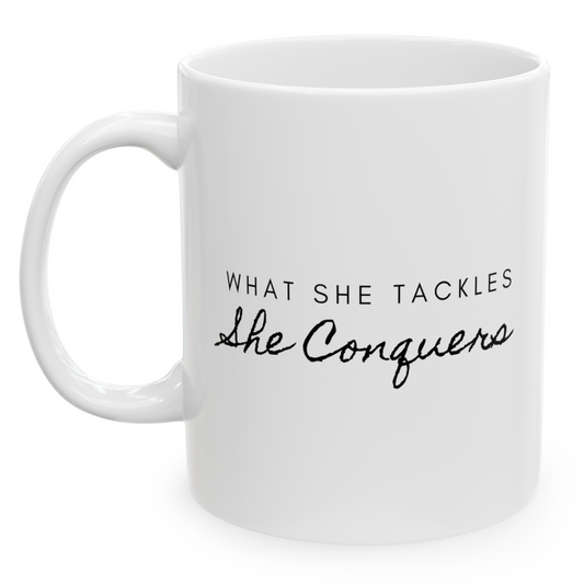 “What She Tackles, She Conquers” Mug