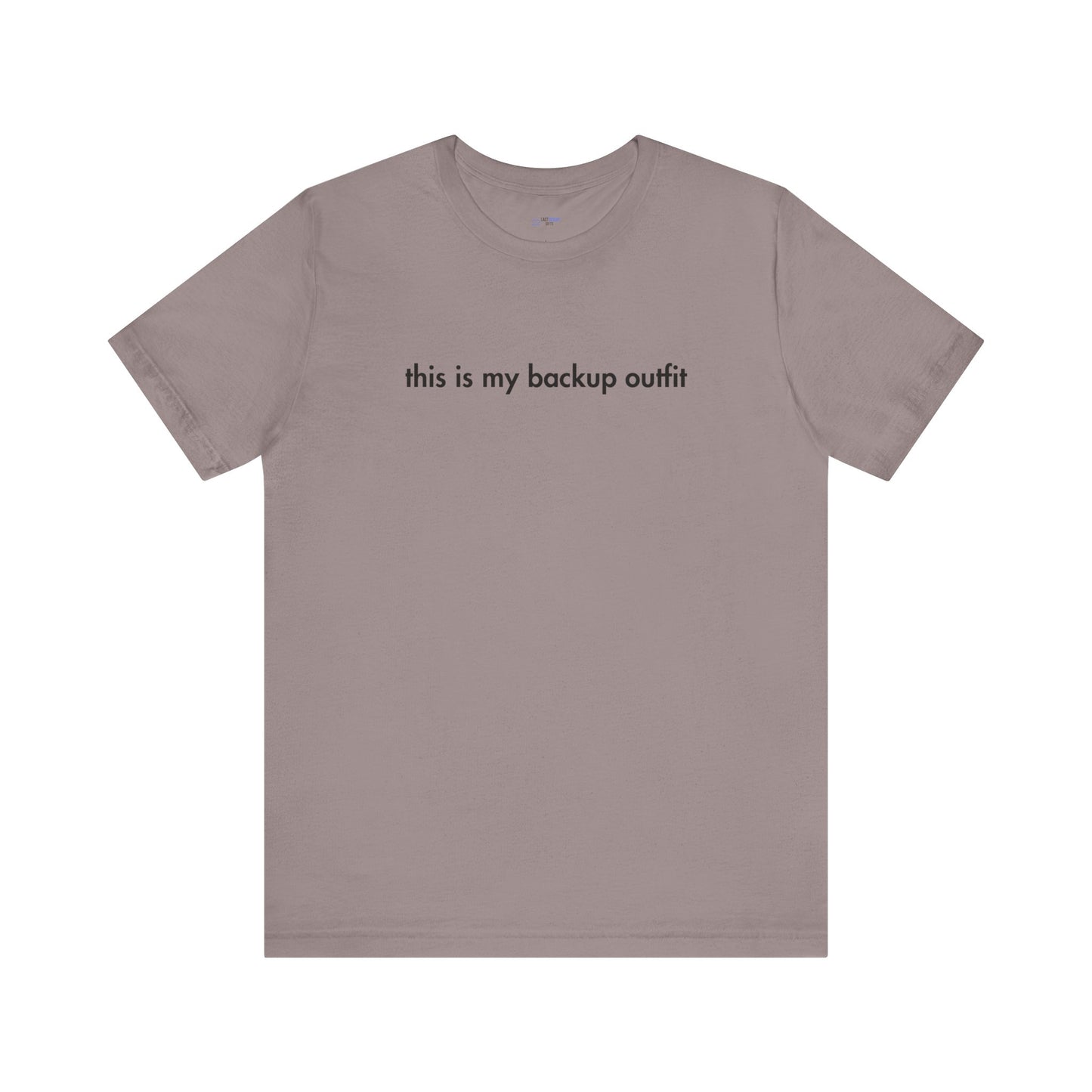Brown t-shirt with text 'this is my backup outfit' on a white background