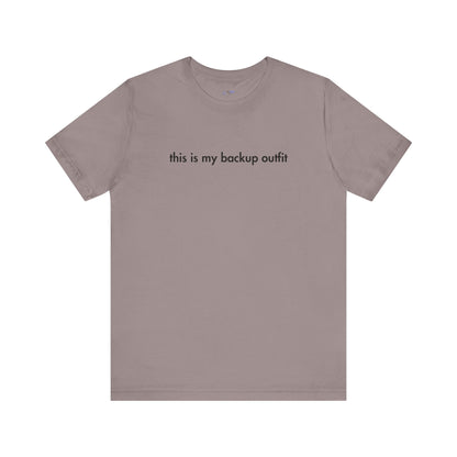 Brown t-shirt with text 'this is my backup outfit' on a white background